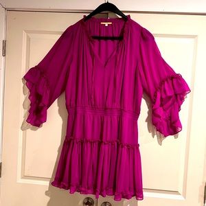 Great Dress! Very flattering, sexy and modern yet not revealing.